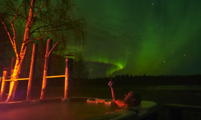 Nothing beats sitting in a hot tub at night watching the northern lights at a spa in Swedish Lapland